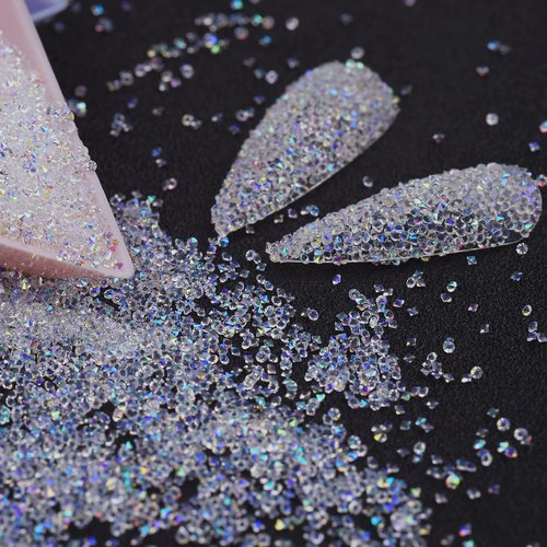HUETFAT 8800Pcs Pixie Nail Crystals Rhinestones-Micro Nail Beads 1.2mm Mini Glass Diamonds Dust Nail Jewels-Tiny Small Gems Stones Iridescent Swarovski Shine-Charms Accessories for Nail Art(Clear AB)