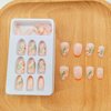 Short Press on Nails Oval Fall Orange French Tip Fake Nails with Cute Flower Designs Acrylic Nails Press ons Reusable Glue on Nails for Women Daily Wear 24 Pcs