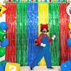 Super Bros Birthday Party Decoration, including 2Pack Red Green Blue Yellow Foil Fringe Curtains, 1pc Mario Themed Birthday Banner & 22pcs Balloons for Video Game Mario Theme Birthday Party Supplies