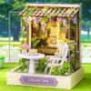 TuKIIE DIY Miniature Dollhouse Kit with Furniture, 1:24 Scale Creative Room Mini Wooden Christmas Doll House Plus Dust Proof for Kids Teens Adults(Leisure Time)