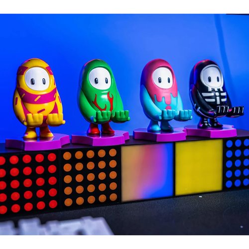 Exquisite Gaming: Holdems: Fall Guys - Skelly - Earbud & Phone Holder, Cable Guys, Media Tonic, Mini Collectibles with a Twist, Licensed Figure