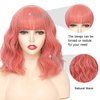 SOKU Short Wavy Pink Wigs for Women 14 Inch Pastel Peachy Short Curly Bob Wig with Bangs Peach Pink Halloween Synthetic Heat Friendly Wigs Pink Cosplay Costume Wig for Daily Party Use