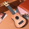 Toddmomy Kids Ukulele Toys Plastic Ukulele Guitar Musical Toy Classical Ukulele Guitar Musical Instrument Educational Toy for Beginner?Light Brown?