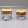 2Pcs 50ml Clear Empty Refillable Glass Bottles Round Cosmetic Jars Container Storage Pot with Natural Bamboo Lids and Sealing Inner Liner for Face Cream, Samples, Balms, Makeup Emulsion Beauty Case