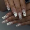 MISUD Press on Nails Long Coffin Fake Nails Glossy Glue on Nails Star Acrylic Nails Ballerina White French Tip Artificial Nails Rhinestone Stick on False Nails with Design 24 pcs