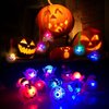 Coluans Halloween Treats 50Pcs Halloween Light Up Rings LED Halloween Toys Glow in The Dark Halloween Party Favors for Kid LED Flash Rings Non Candy Gift Bag Fillers NEW VERSION