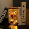 Roroom DIY Book Nook Kit, DIY Dollhouse Booknook Bookshelf Insert Decor Alley,with Music Box 3D Wooden Puzzle (Sakura Holiday-M2211)