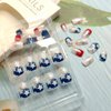 24Pcs Independence Day Press on Nails Petite Short Fake Nails Glitter Patriotic Stars Full Cover Design Square False Nails French Tip Glue on Nails 4th of July Artificial Acrylic Nails for Women Decor