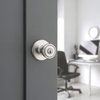 Kwikset Tylo Entry Door Knob with Lock and Key, Secure Keyed Handle Exterior, Front Entrance and Bedroom, Satin Nickel, Pick Resistant SmartKey Rekey Security and Microban
