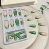 Tyuimhx Green Cat Eye Press on Nails Medium Almond Fake Nails Glitter French Tip False Nails with Flowers Designs Full Cover Stick on Nails Acrylic Artificial Nails for Women Girls Glue on Nails 24Pcs