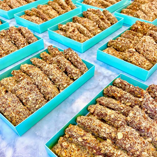 MalibuGift gourmet english toffee candy. Sticks of gourmet english toffee rolled in gourmet chocolate and roasted almonds