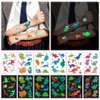Dinosaur Glow Temporary Tattoos for Kids,Dinosaur theme Luminous Tattoos Stickers,Glow In The Dark Tattoos for Boys and Girls,Face Makeup Fake Tattoos,Holiday Party Supplies Gifts for Children
