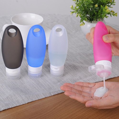 Silicone Travel Bottle Set TSA Approved Carry On Shampoo Conditioner Bottle Leak Proof Design BPA Free for Cosmetics 3.3 Oz (4 Pack + Lanyard (White Bottles))