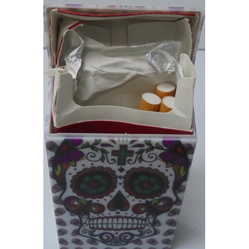 Eclipse CANDY SKULL Cigarette case. Holds 100s size. Holds 1 pack of Cigarettes. Flip to open.