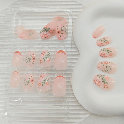 Short Press on Nails Oval Fake Nails Orange French Tip Nails Press ons with Cute Flower Patterns Designs Acrylic Nails Full Cover Glue on Nails Glossy Stick on Nails for Women 24 Pcs