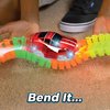 Ontel Magic Tracks 10 Foot Glow In The Dark Bendable Flexible Racetrack with LED Light-Up Race Car, Educational Playset Birthday Gift for Ages 3+