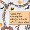 300 Halloween-Themed Paper Chain Strips for Crafting. No Glue or Tape Needed. Kid Friendly & Family Fun. 10 Spooky Patterns. Over 50 Feet of Paper Chains for Party Decorations & Classroom Decorations