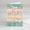 Designer Greetings Christmas Cards - Box Set 18 Cards and 18 Envelopes - Merry Christmas Written in the Sand with Seashells Spelling Merry