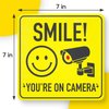 ASSURED SIGNS Smile You're On Camera Signs Stickers - 7 X 7 Inch - 8 Pack - Polite Video Surveillance Security Sign to Prevent Trespassing on Your Private Property - Perfect for House, Business, Yard or Driveway