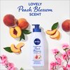 Nivea Oil Infused Peach Blossom and Avocado Oil Body Lotion, Body Lotion for Dry Skin, 16.9 Fl Oz Pump Bottle