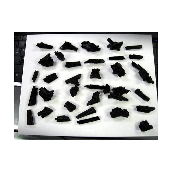 NATURAL BLACK TOURMALINE CRYSTALS.ROUGH, UNPOLISHED, NATURAL. 35 PIECES TOTAL. WEIGHT FULL 1/2 POUND.