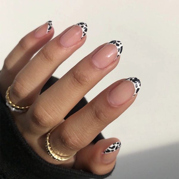 MERVF Short Press on Nails Oval French Tip Fake Nails White Round Glue on Nails with Cow Print Design Glossy 24pcs Artificial Acrylic Nails for Women