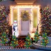 Windpnn Upgraded 4-Pack Solar Christmas Garden Stake Lights, Decorative Xmas Tree Solar Christmas Yard Stake Outdoor Waterproof Christmas Pathway Lights for Christmas Decoration Garden Patio Yard