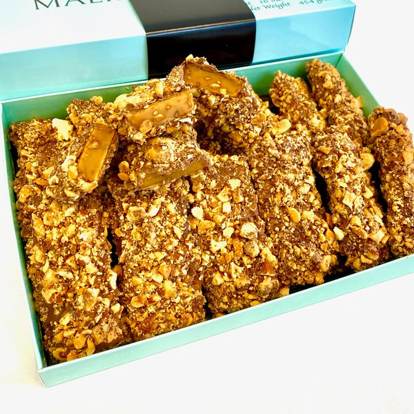MalibuGift gourmet english toffee candy. Sticks of gourmet english toffee rolled in gourmet chocolate and roasted almonds