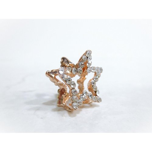 Small mini rose gold star shaped hair claw clip with crystals