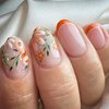 Short Press on Nails Oval Fake Nails Orange French Tip Nails Press ons with Cute Flower Patterns Designs Acrylic Nails Full Cover Glue on Nails Glossy Stick on Nails for Women 24 Pcs