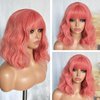 SOKU Short Wavy Pink Wigs for Women 14 Inch Pastel Peachy Short Curly Bob Wig with Bangs Peach Pink Halloween Synthetic Heat Friendly Wigs Pink Cosplay Costume Wig for Daily Party Use