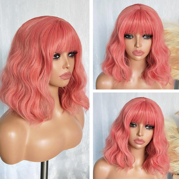 SOKU Short Wavy Pink Wigs for Women 14 Inch Pastel Peachy Short Curly Bob Wig with Bangs Peach Pink Halloween Synthetic Heat Friendly Wigs Pink Cosplay Costume Wig for Daily Party Use
